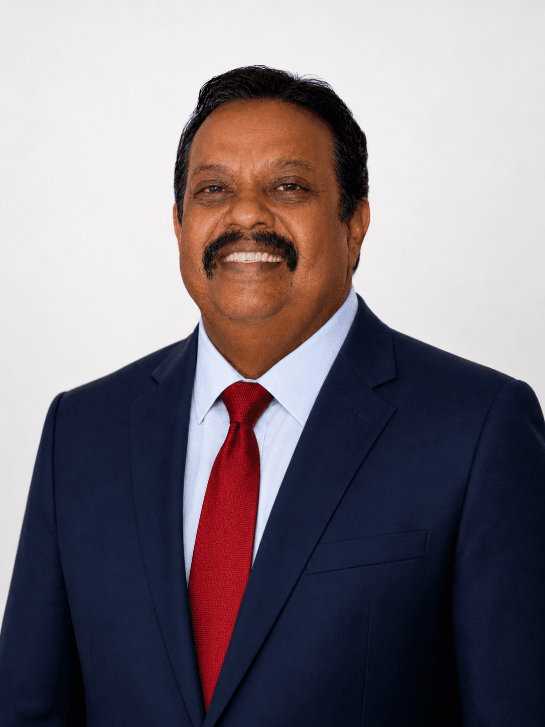 Umaid Kishan, Partner · Retired banker
